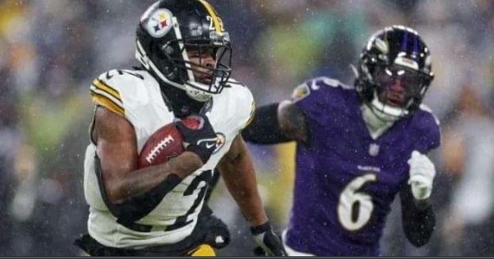 Steelers battle the elements to beat Ravens and to maintain their hopes of making the playoffs.