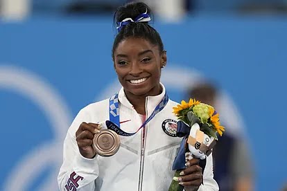 Simone Biles flaunts her fierce attitude and is ready to reclaim her throne after the Tokyo 2020 nightmare