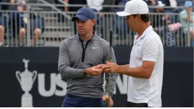 Rory McIlroy and Scottie Scheffler look at Xander Schauffele’s predictions