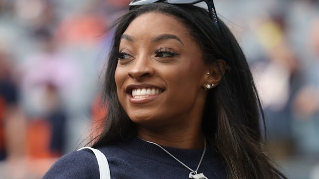 Simone Biles beams as she shares good news during reunion with Jonathan Owens: Olympic gymnast has found love